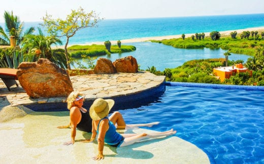 Relaxing by a pool with a beautiful view in Baja, Mexico.