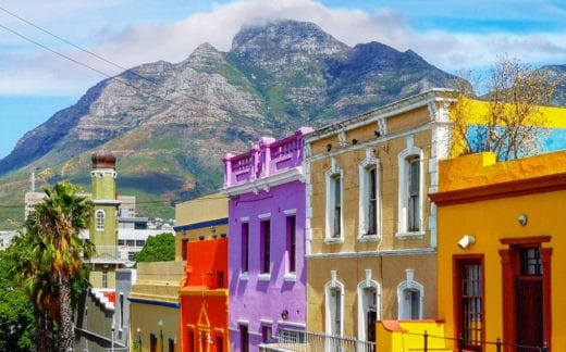 Cape town Bo Kaap Malay quarter rooftops with table mountain in the background, featuring the typical colorful houses.