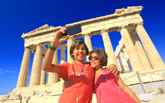 Kids taking selfie in front of Parthenon