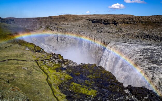 Rainbow over waterfall