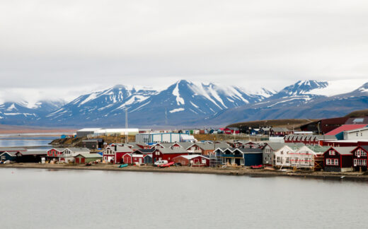 small town with mountain range in background