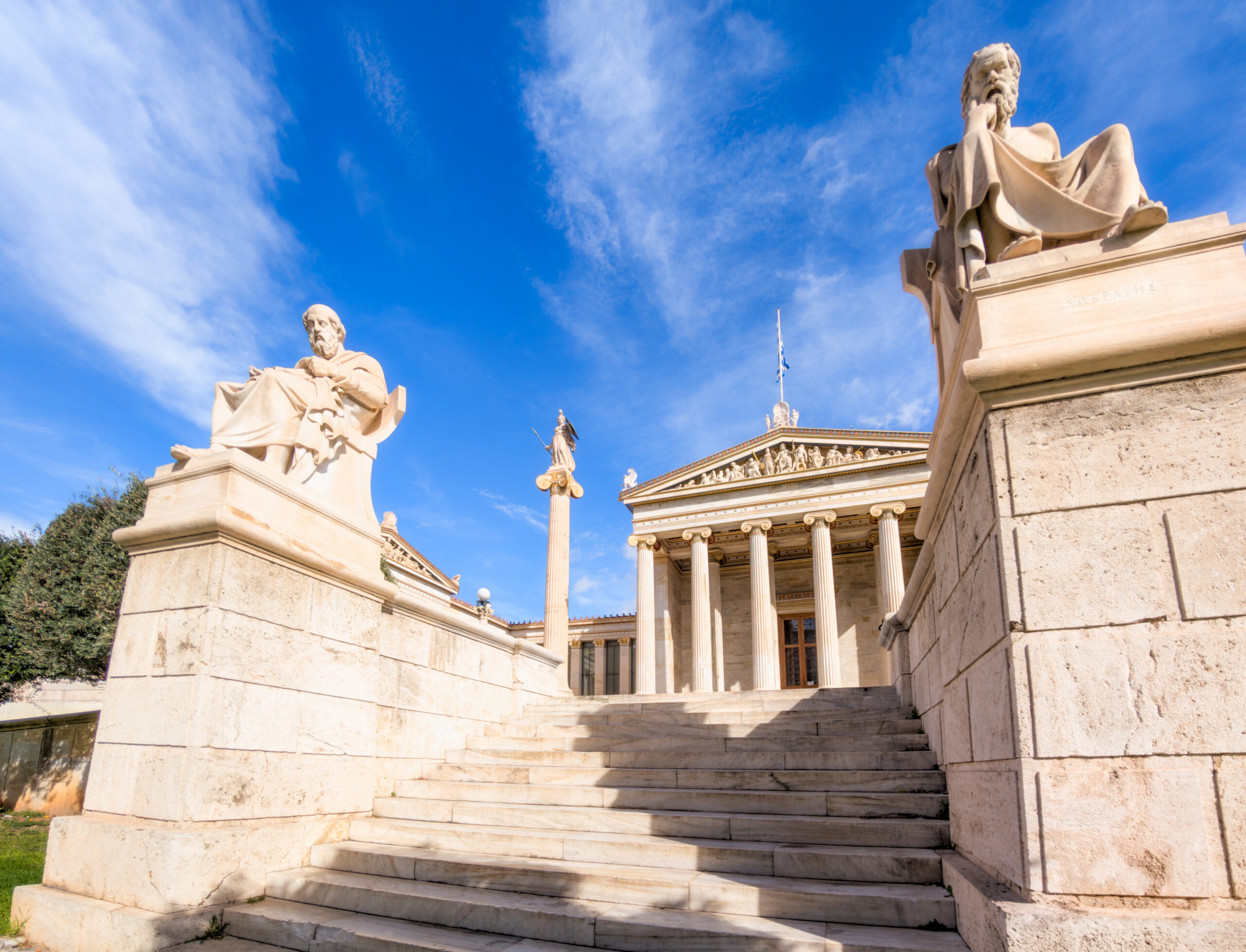 Large statues of the classical Greek philosophers Plato and Socrates at the Academy of Athens in the centre of the Greek Capital. The statues was completed in 1885 by Leonidas Drosis.