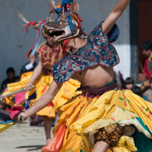 Colorful dancer at a Bhutanese festival.